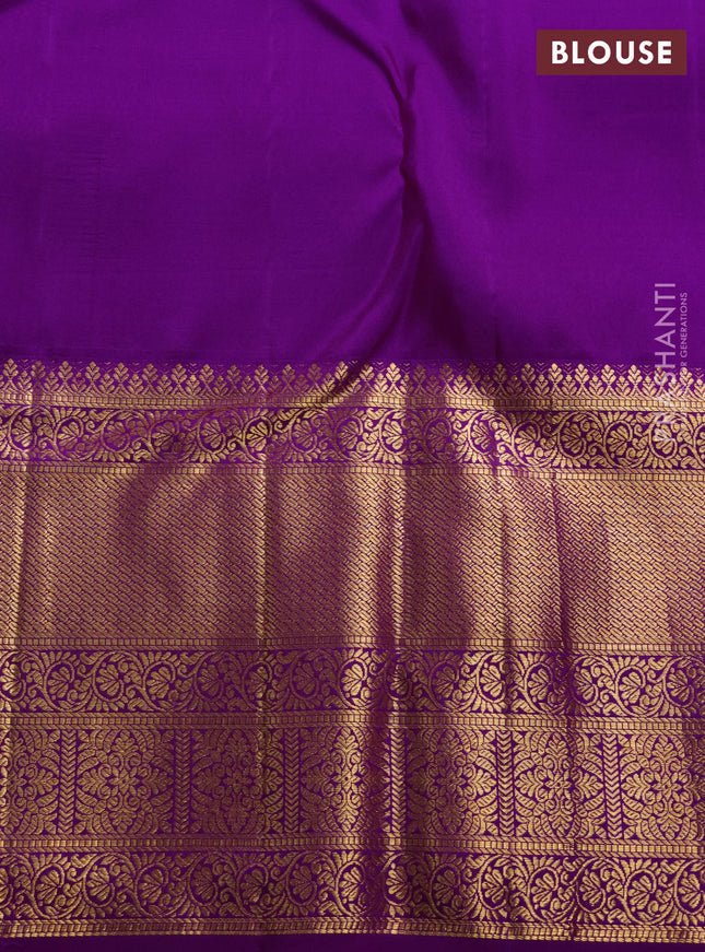 Pure kanchipuram silk saree peach shade and purple with allover zari woven brocade weaves and long rich zari woven border
