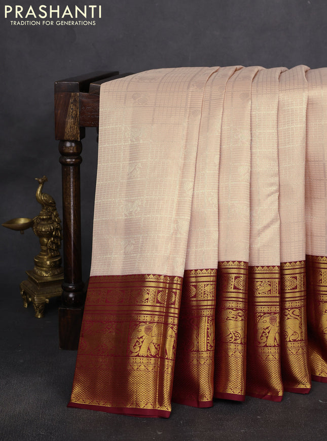 Pure kanchipuram silk saree pastel peach and maroon with allover silver zari woven brocade weaves and long rich zari woven border