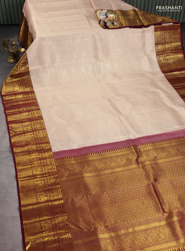 Pure kanchipuram silk saree pastel peach and maroon with allover silver zari woven brocade weaves and long rich zari woven border
