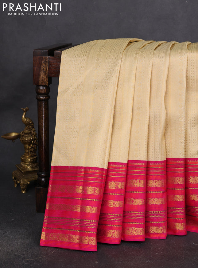 Pure kanchipuram silk saree sandal and pink with allover zari woven brocade weaves and long rich zari woven border