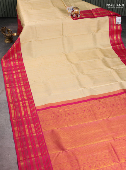 Pure kanchipuram silk saree sandal and pink with allover zari woven brocade weaves and long rich zari woven border