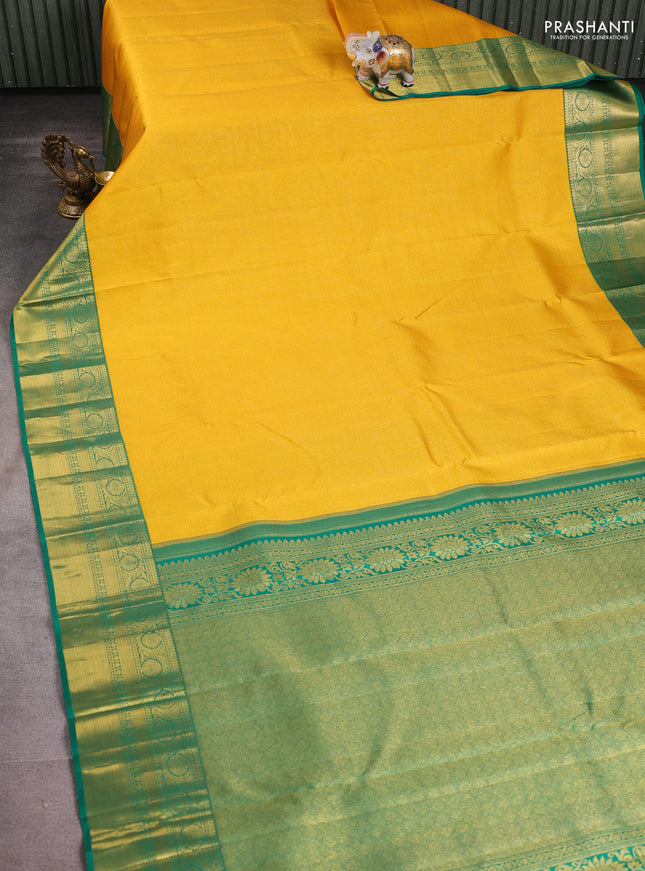 Pure kanchipuram silk saree mango yellow and green with allover zari woven brocade weaves and rich zari woven border