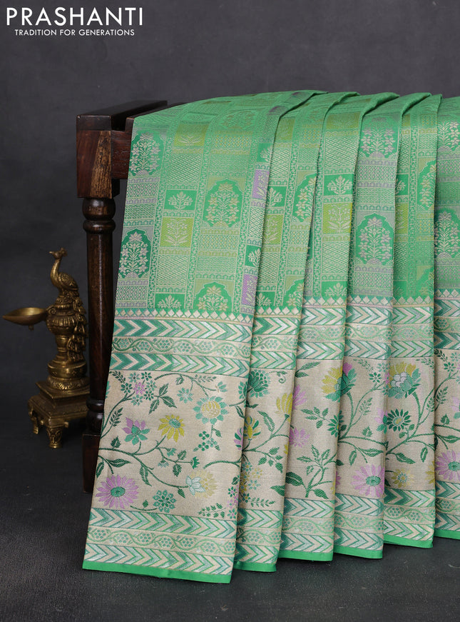 Pure kanchipuram silk saree teal green with allover zari woven brocade weaves and long rich floral zari woven border