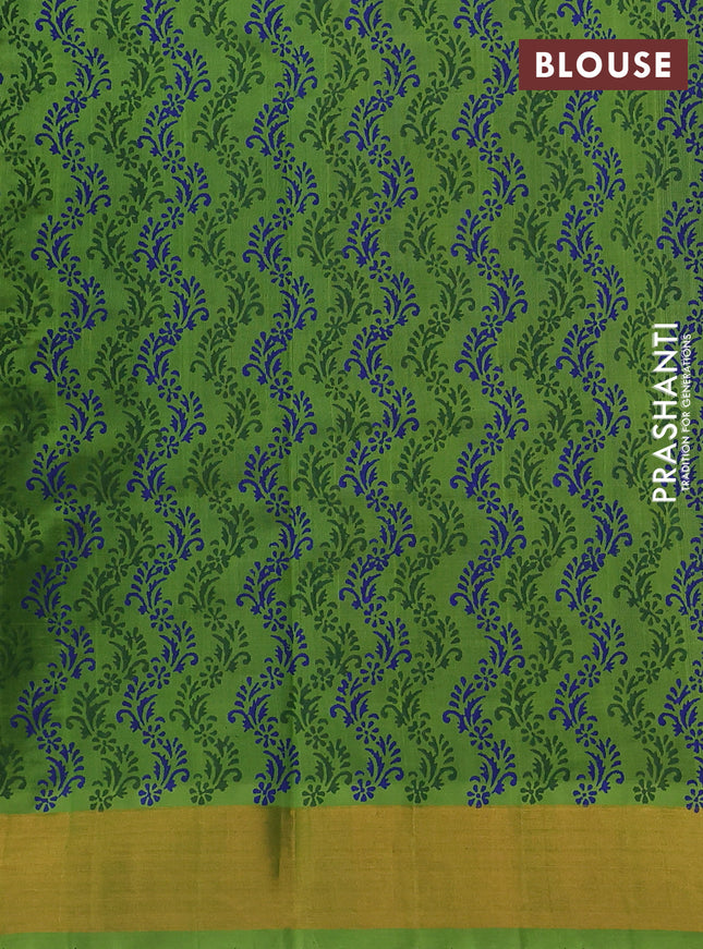 Silk cotton block printed saree blue and light green with allover prints and zari woven border