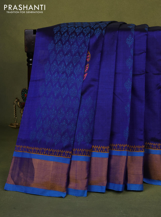 Silk cotton block printed saree blue and cs blue with allover prints and zari woven border