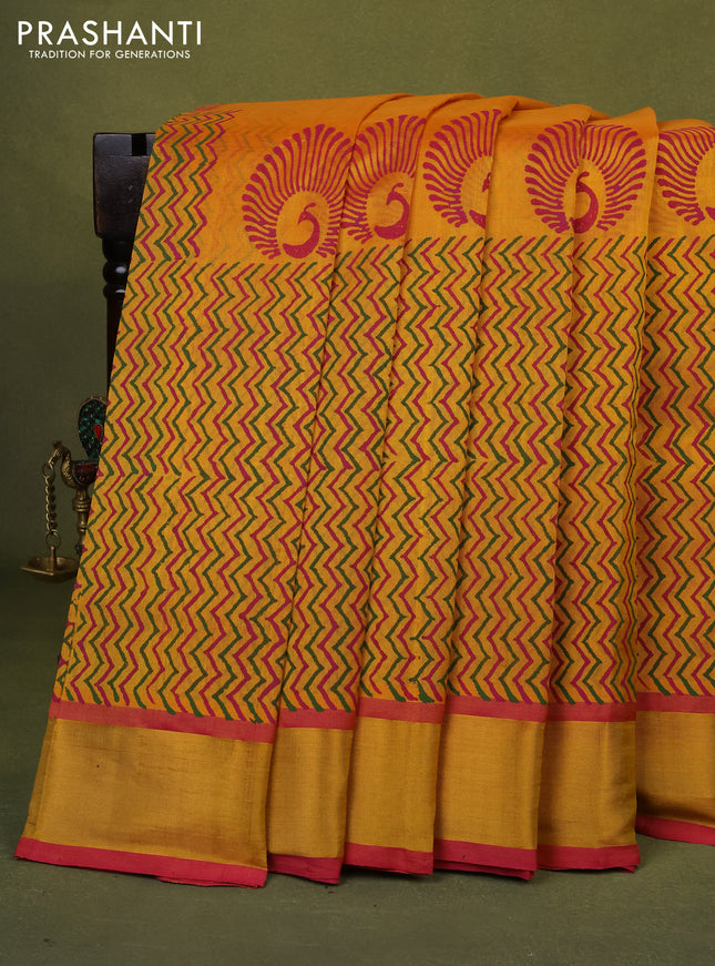 Silk cotton block printed saree yellow and pink with allover prints and zari woven border