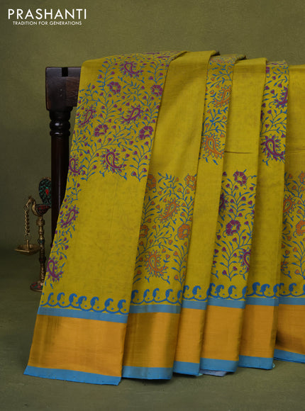 Silk cotton block printed saree lime yellow and cs blue with allover prints and zari woven border