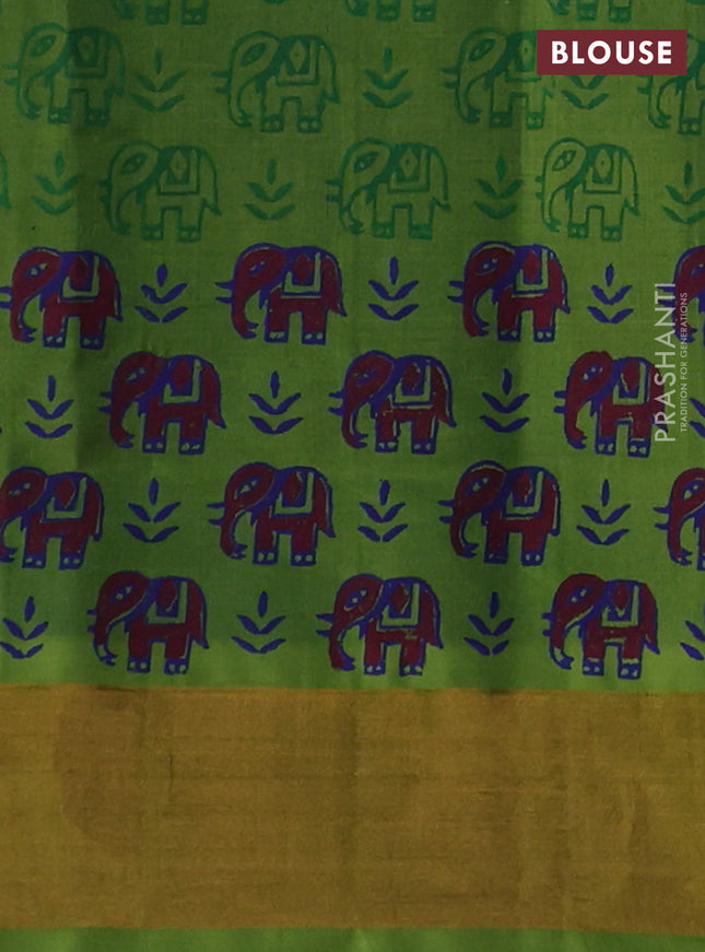 Silk cotton block printed saree blue and light green with allover prints and zari woven border