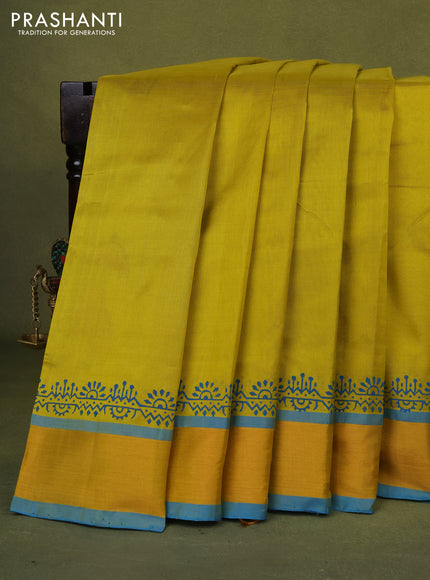 Silk cotton block printed saree lime yellow and cs blue with butta prints and zari woven border