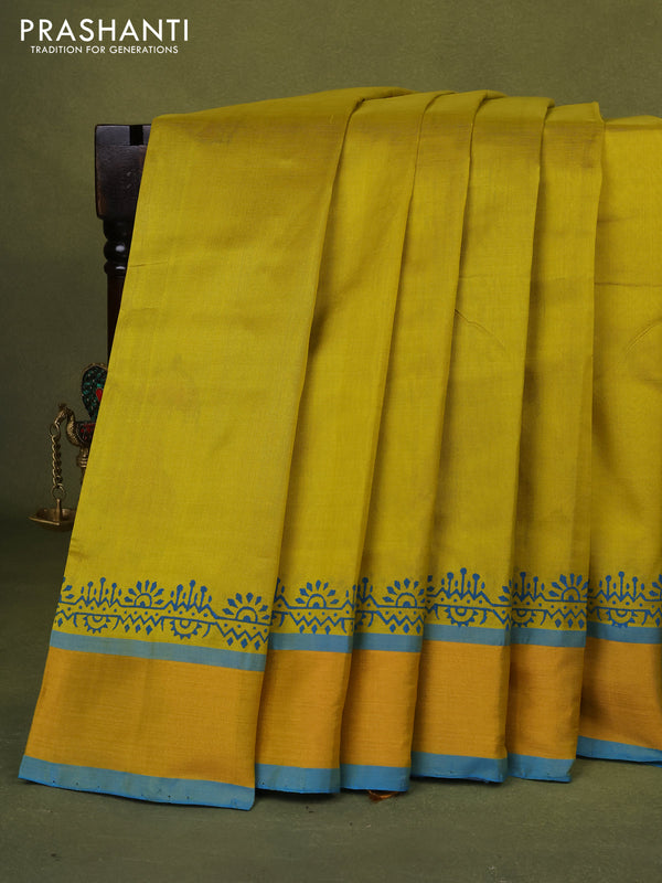 Silk cotton block printed saree lime yellow and cs blue with butta prints and zari woven border