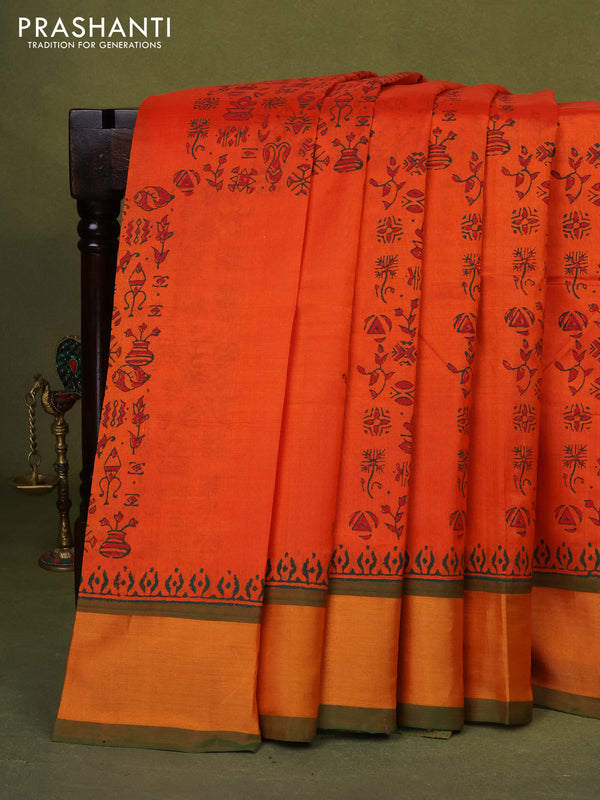 Silk cotton block printed saree orange and green with allover prints and zari woven border