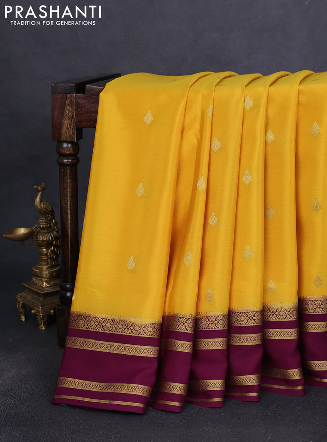 Pure mysore silk saree yellow and deep purple with allover zari woven buttas and zari woven border