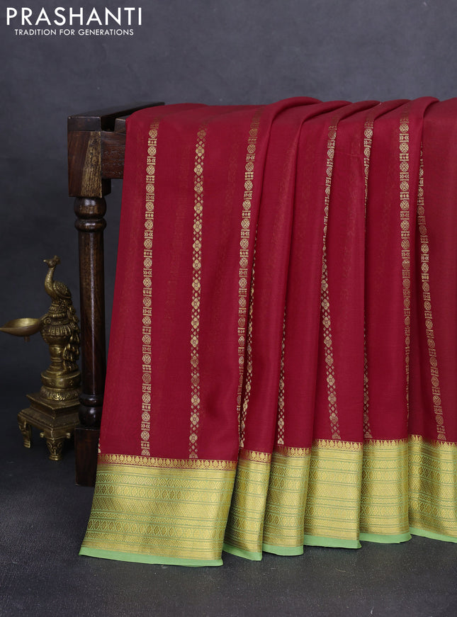 Pure mysore silk saree red and green with allover zari weaves and zari woven border