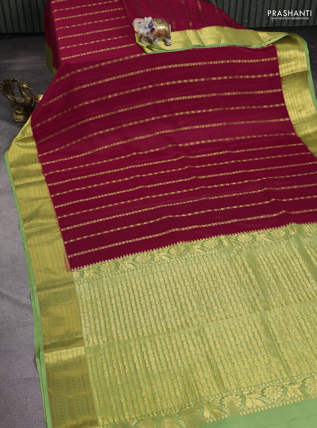 Pure mysore silk saree red and green with allover zari weaves and zari woven border