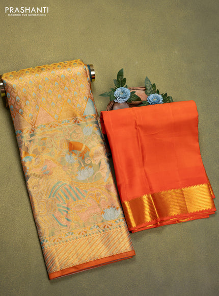 Pure tissue silk lehenga dhawani mustard yellow and orange with allover zari woven brocade weaves and long rich zari woven border