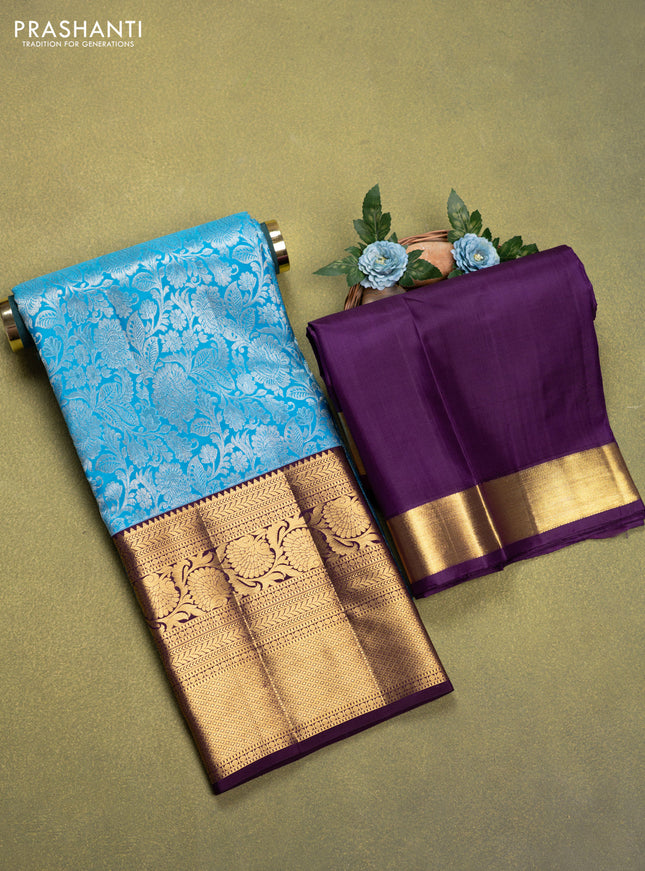 Pure silk lehenga dhawani light blue and wine shade with allover silver zari woven brocade weaves and long rich zari woven border