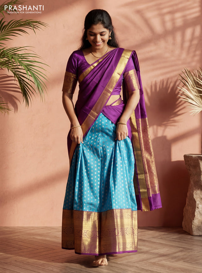 Pure silk lehenga dhawani light blue and deep purple with allover silver zari woven buttas and long rich zari woven border