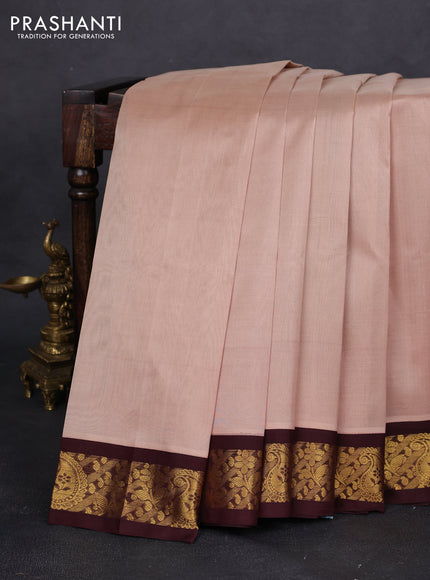 Silk cotton saree beige and deep maroon with plain body and zari woven korvai border