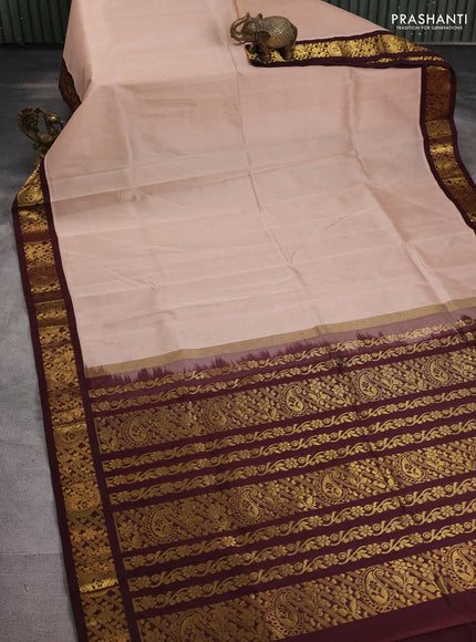 Silk cotton saree beige and deep maroon with plain body and zari woven korvai border
