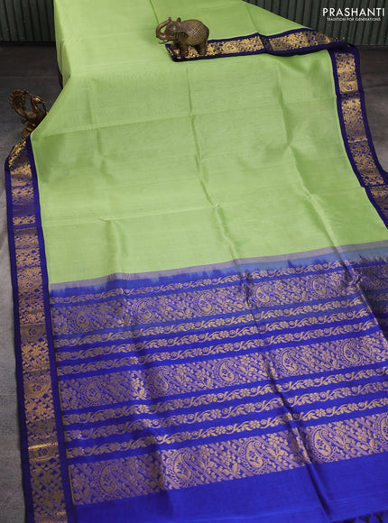Silk cotton saree pista green and blue with plain body and zari woven korvai border