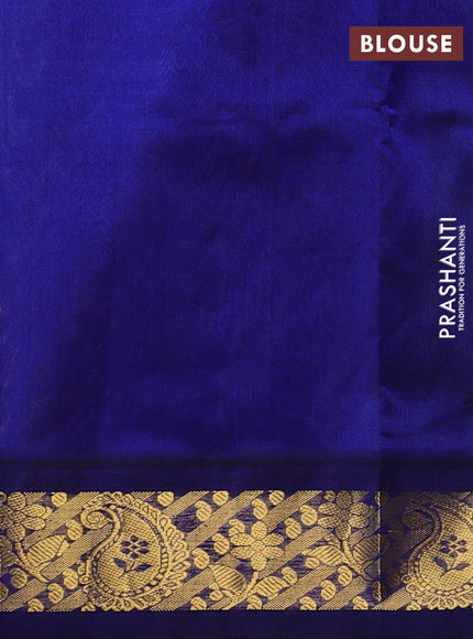 Silk cotton saree pista green and blue with plain body and zari woven korvai border