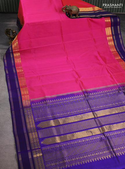 Silk cotton saree pink and blue with plain body and zari woven korvai border