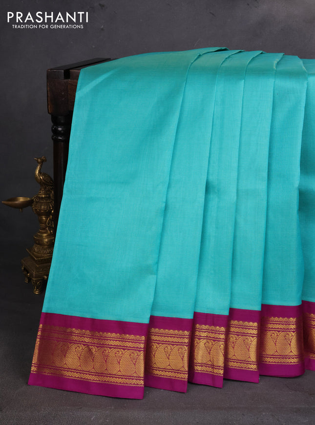 Silk cotton saree teal blue and purple with allover vairaosi pattern and zari woven korvai border