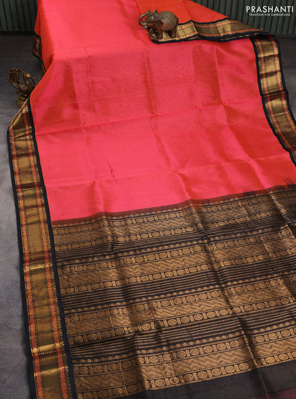 Silk cotton saree dual shade of pinkish orange and black with allover vairaosi pattern and zari woven korvai border