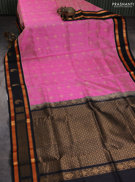 Silk cotton saree light pink and black with allover self emboss & zari buttas and rettapet zari woven korvai border
