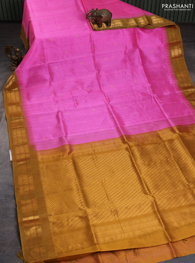 Silk cotton saree candy pink and dark mustard with zari woven buttas and temple zari woven korvai border