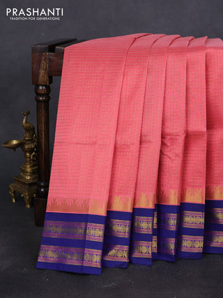 Silk cotton saree peach pink and blue with allover small checked pattern and temple rettapet zari woven kovai border