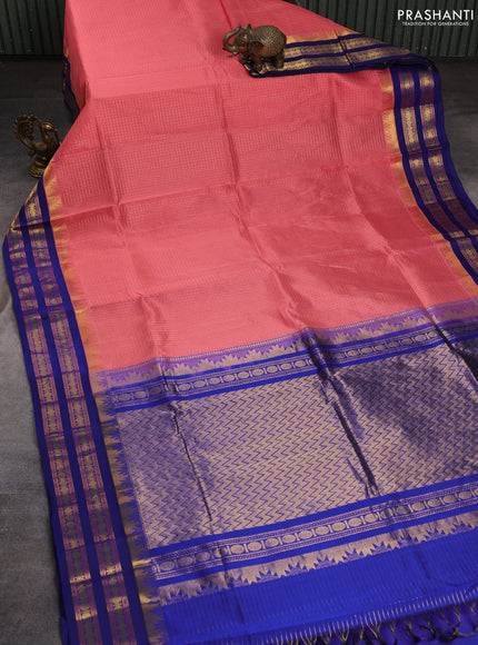 Silk cotton saree peach pink and blue with allover small checked pattern and temple rettapet zari woven kovai border