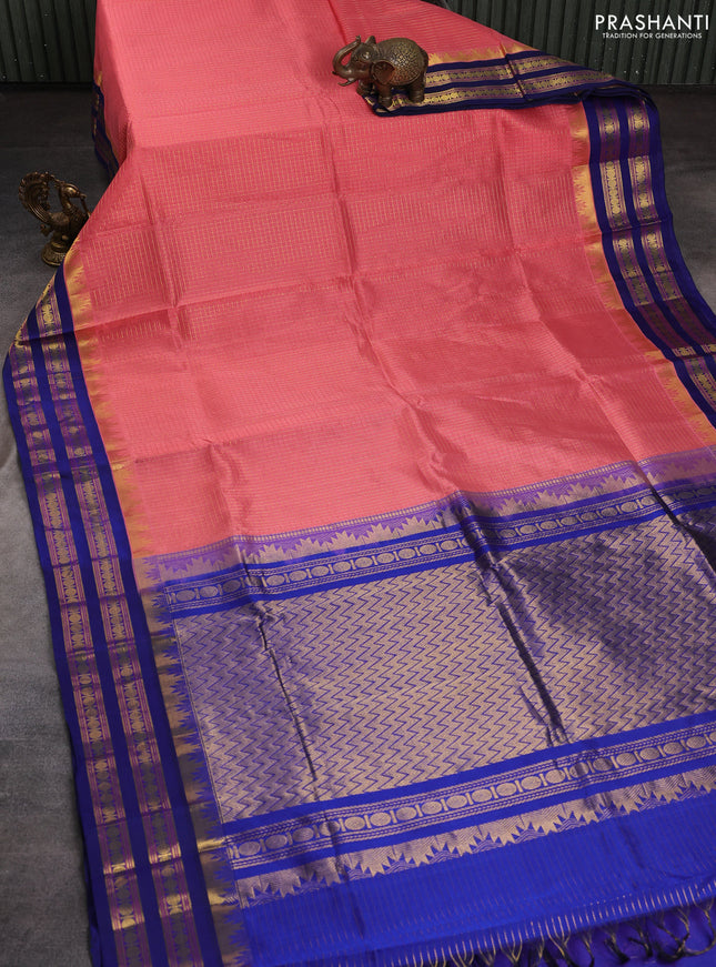 Silk cotton saree peach pink and blue with allover small checked pattern and temple rettapet zari woven kovai border