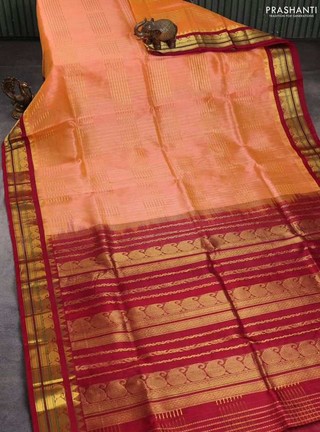 Silk cotton saree dual shade of orange and maroon with allover checked pattern and temple rettapet zari woven kovai border