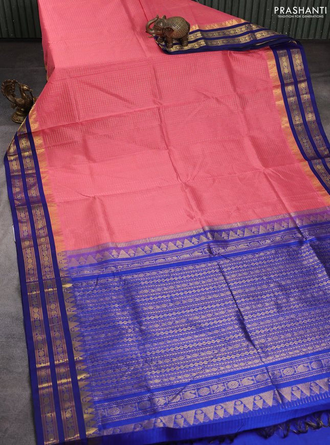 Silk cotton saree peach pink and blue with allover small checked pattern and temple rettapet zari woven kovai border