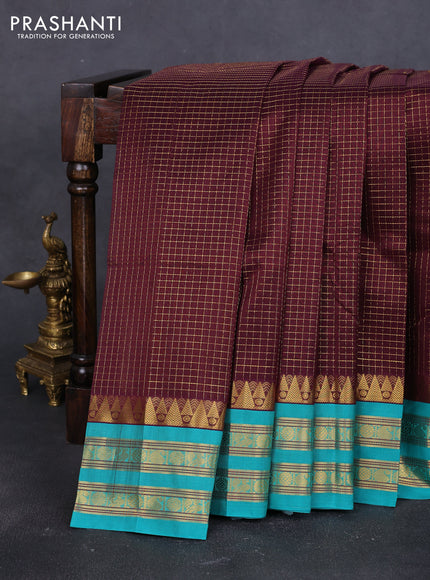 Silk cotton saree deep jamun shade and teal green with allover small checked pattern and temple rettapet zari woven korvai border