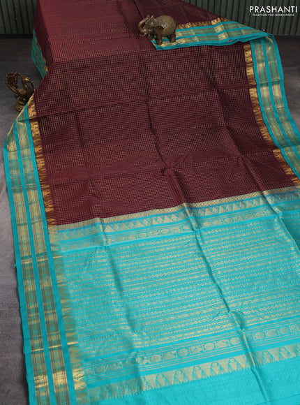 Silk cotton saree deep jamun shade and teal green with allover small checked pattern and temple rettapet zari woven korvai border