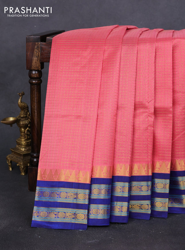 Silk cotton saree peach pink and blue with allover small checked pattern and temple design rettapet zari korvai border