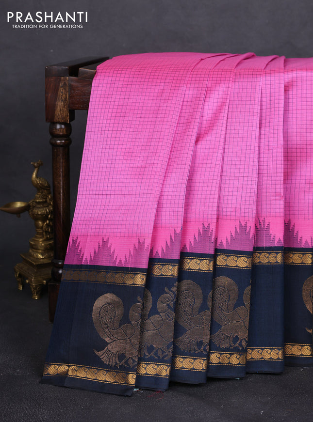 Silk cotton saree light pink and peacock green with allover checked pattern and temple design rettapet zari korvai border