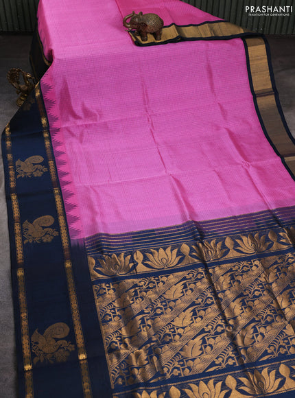 Silk cotton saree light pink and peacock green with allover checked pattern and temple design rettapet zari korvai border