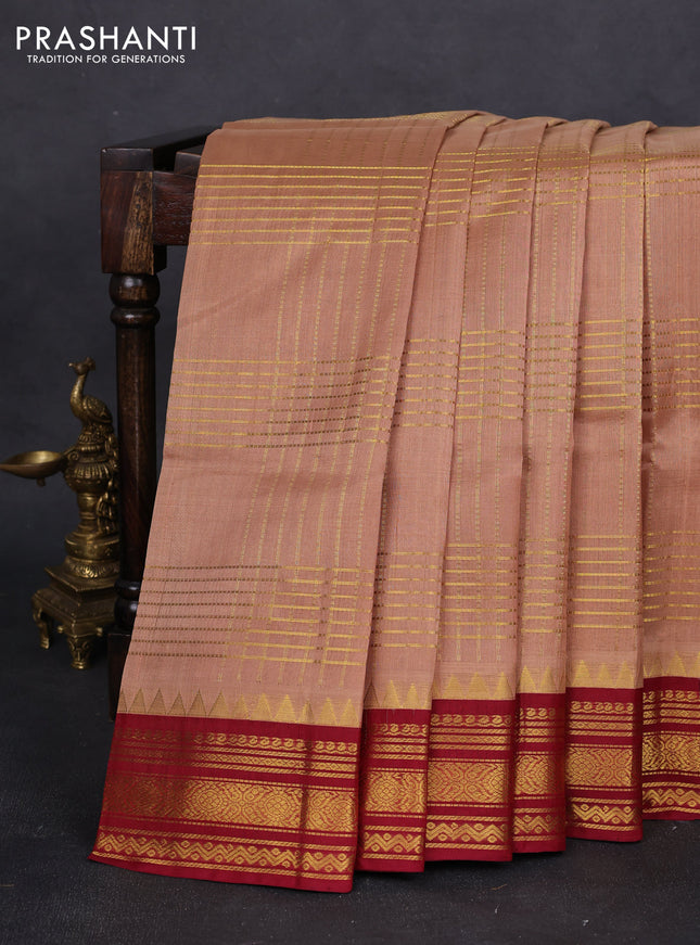 Silk cotton saree sandal and maroon with allover zari checked pattern and zari woven korvai border