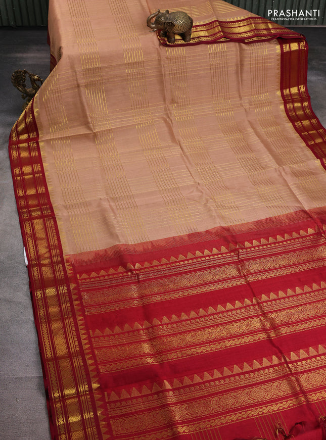 Silk cotton saree sandal and maroon with allover zari checked pattern and zari woven korvai border