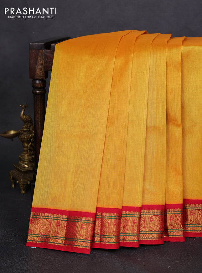 Silk cotton saree yellow and red with plain body and zari woven border