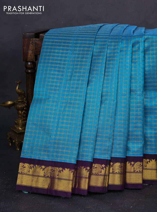 Silk cotton saree cs blue and violet with allover zari woven checked pattern and zari woven korvai border