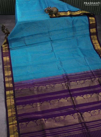 Silk cotton saree cs blue and violet with allover zari woven checked pattern and zari woven korvai border