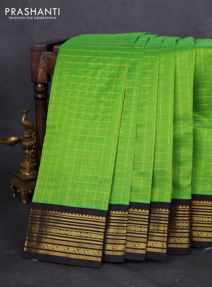 Silk cotton saree light green and deep coffee brown with allover zari checked pattern and zari woven korvai border