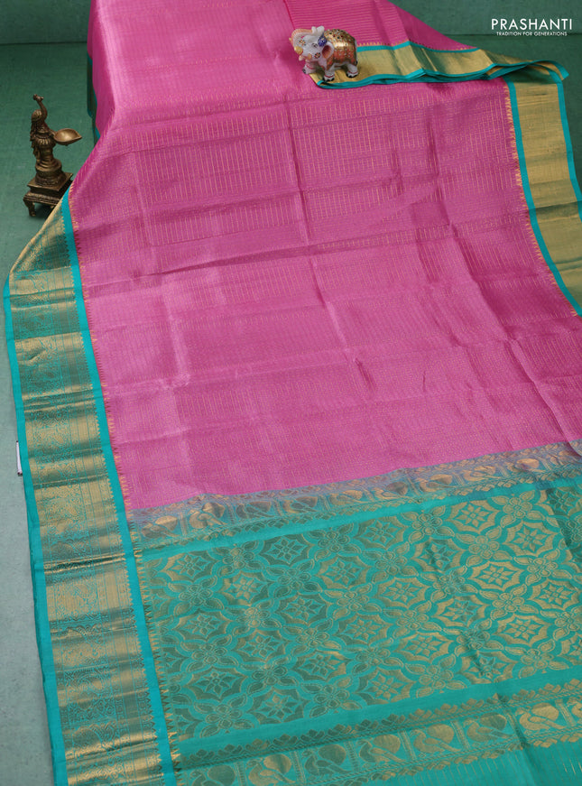 Kuppadam silk cotton saree light pink and teal green with allover laksha deepam weaves and zari woven border