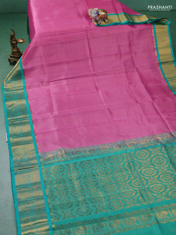 Kuppadam silk cotton saree light pink and teal green with allover laksha deepam weaves and zari woven border