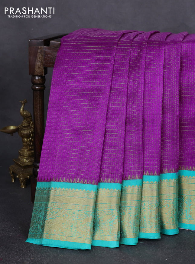 Kuppadam silk cotton saree purple and teal blue with allover zari checks & lakshadeepam weaves and zari woven border
