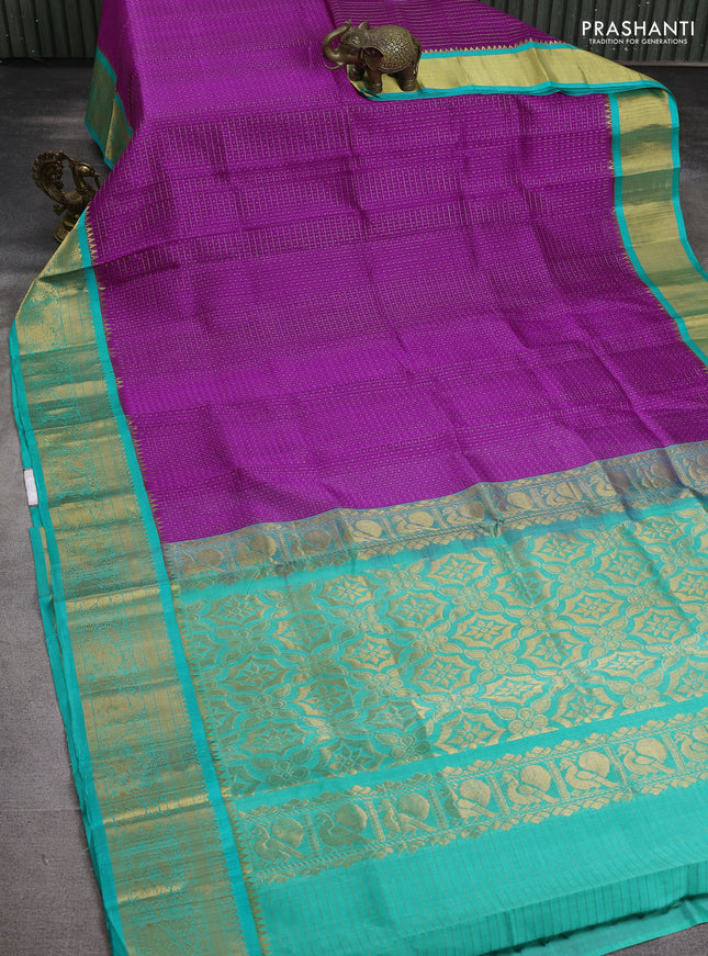Kuppadam silk cotton saree purple and teal blue with allover zari checks & lakshadeepam weaves and zari woven border